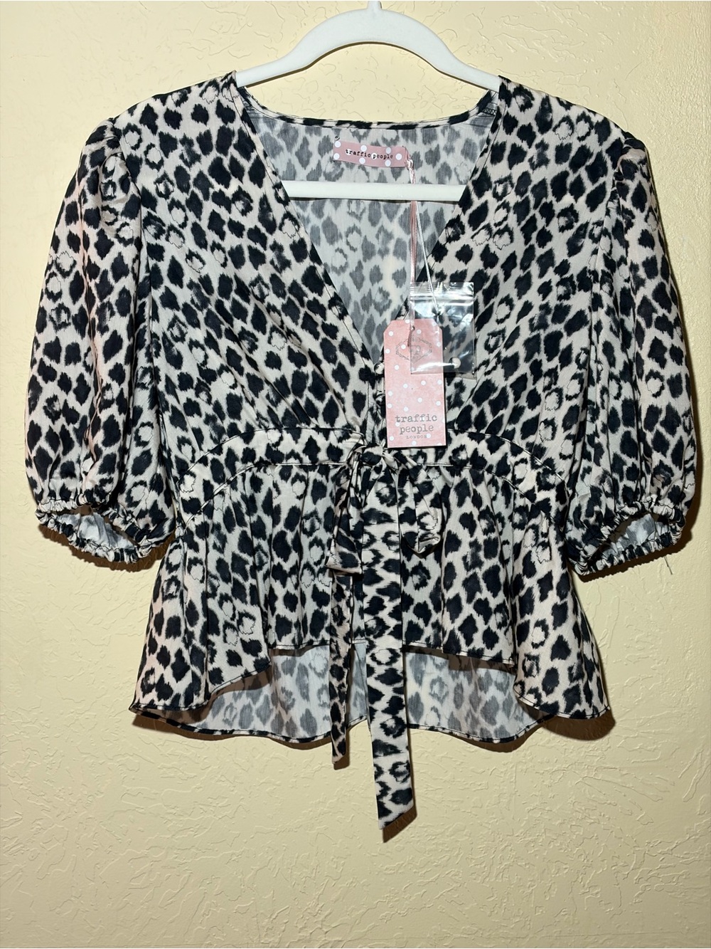 Traffic People - Black and White Leopard Peplum Tie-Front Blouse